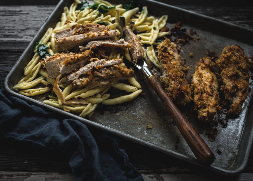 Spicy Oven Baked Coconut Crusted Chicken over Pasta